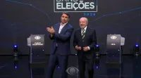 Lula fala em quebra de sigilo; Flávio responde que petista não tem celular